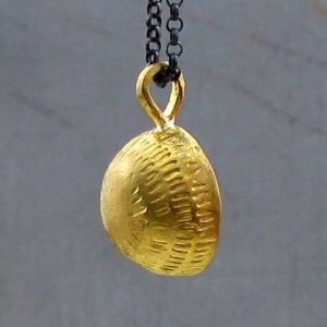 Dome 22k gold pendant on silver chain