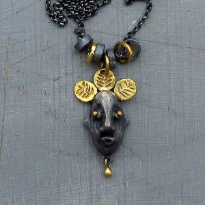 Artisan face 22 karat gold & silver necklace