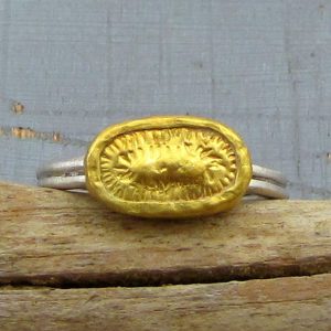 Elliptic 24k gold ring with silver band