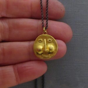 Face 22k gold & silver necklace