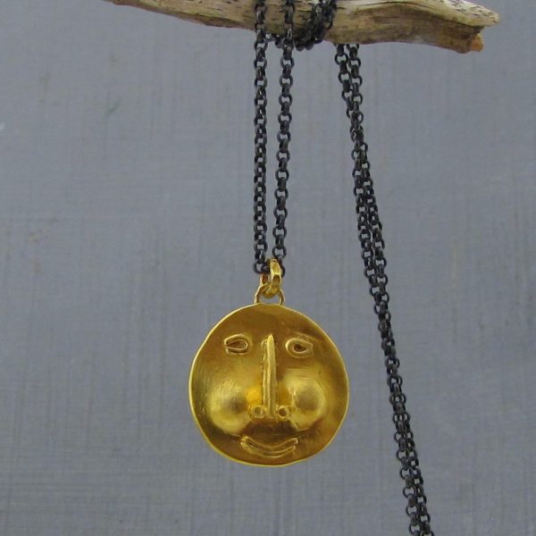 Face 22k gold & silver necklace