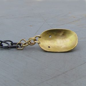 Handmade solid 14k gold Face pendant on a silver chain