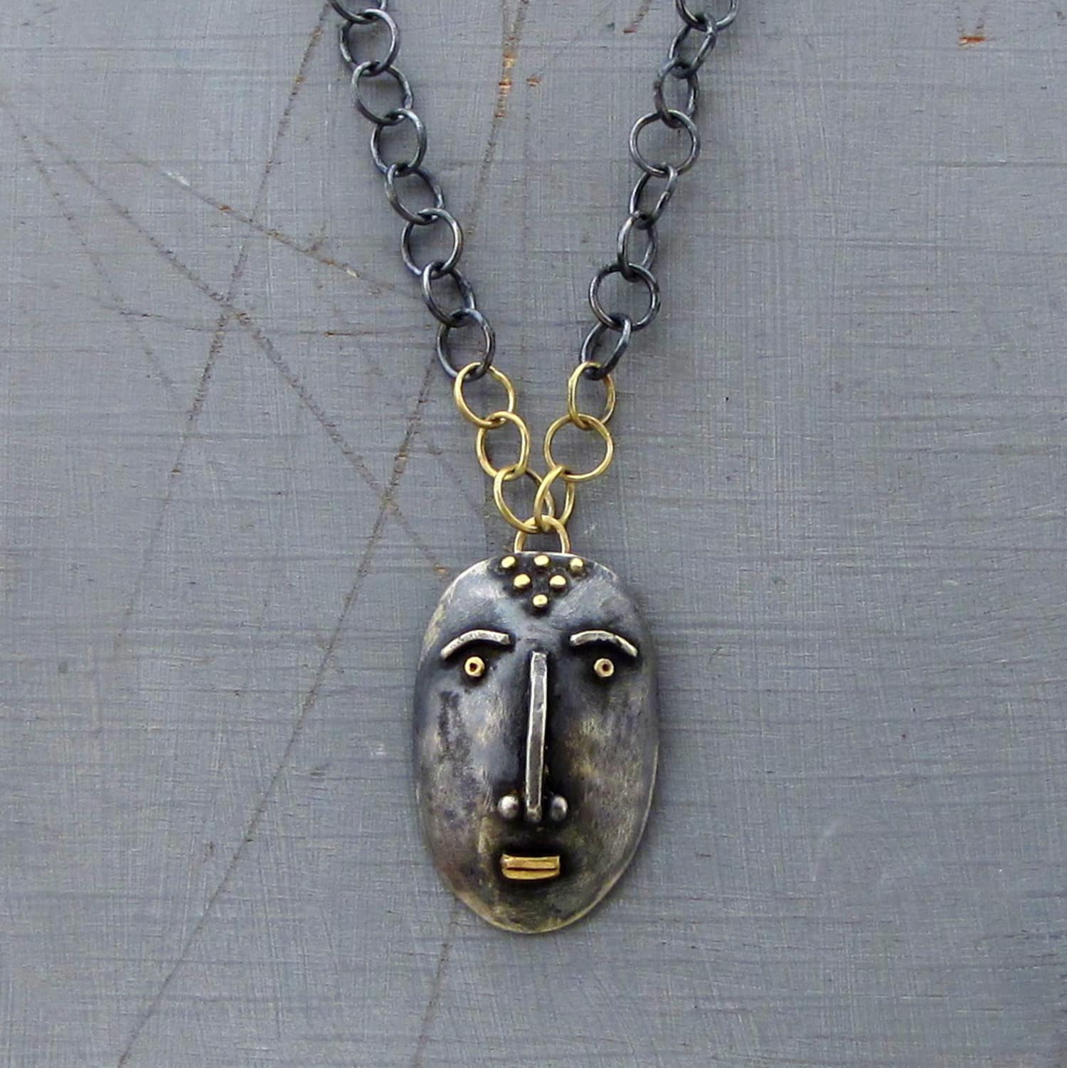 Handmade artisan face silver & 14 karat gold necklace