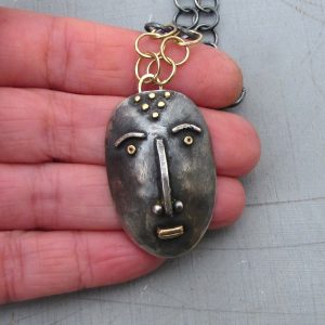 Handmade artisan face silver & 14 karat gold necklace