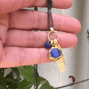 Lapis Lazuli 24k gold pendant on a silver chain