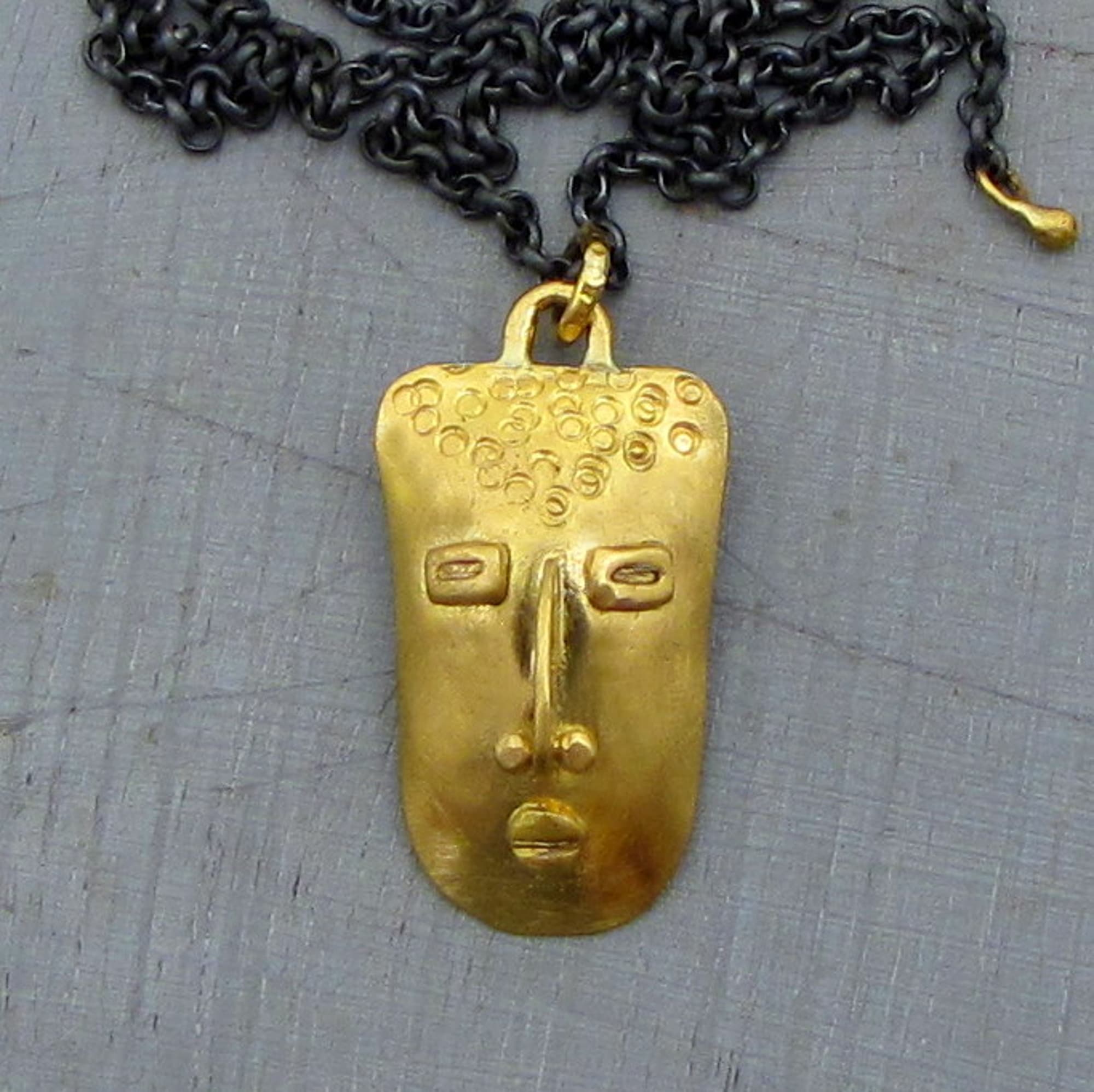 Handmade 22k gold face pendant