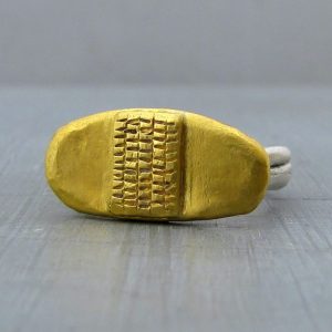 Solid 24k gold ring with silver band