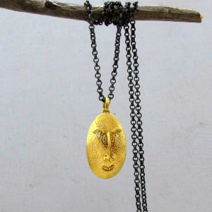 Handmade 22 karat gold Face pendant