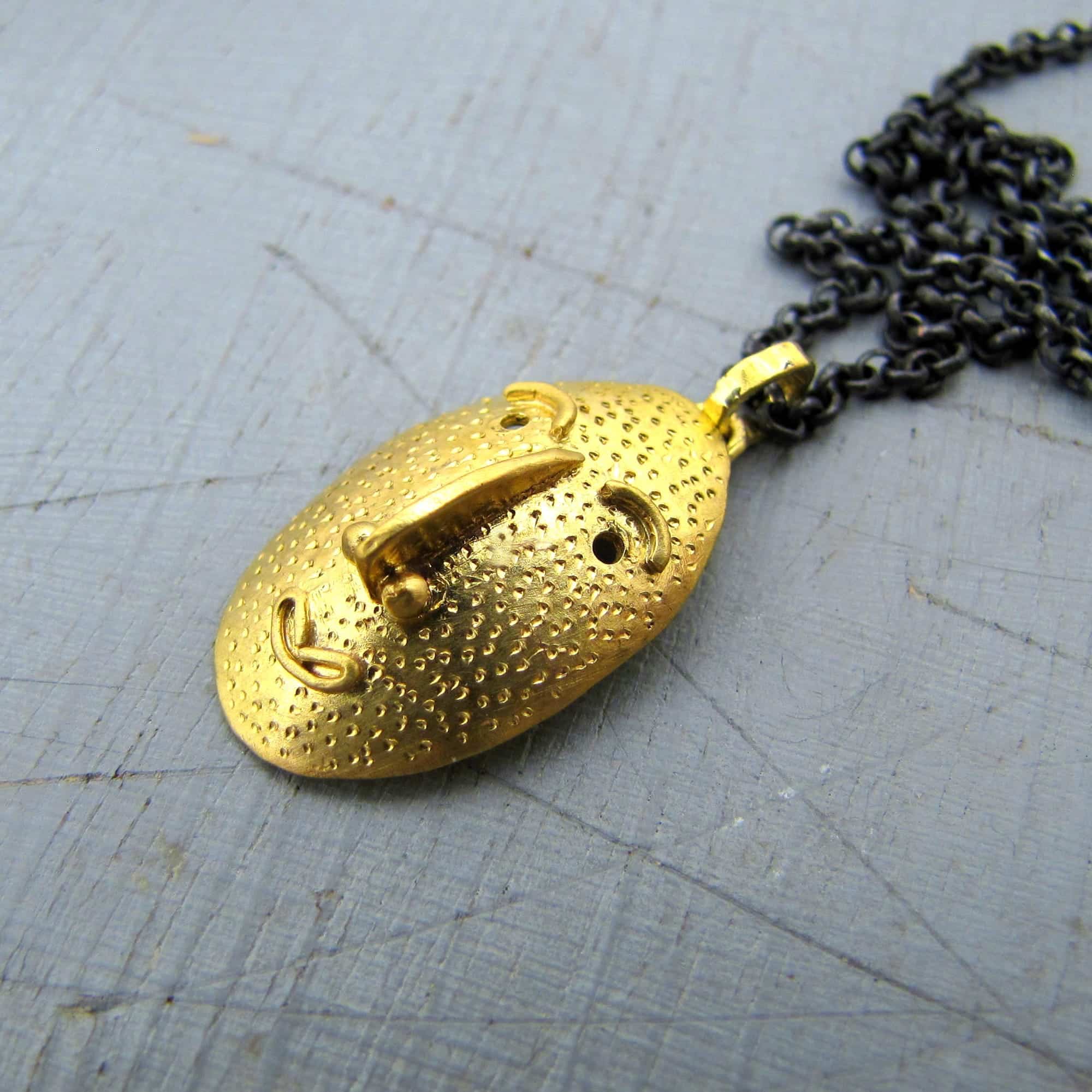 Handmade 22 karat gold Face pendant