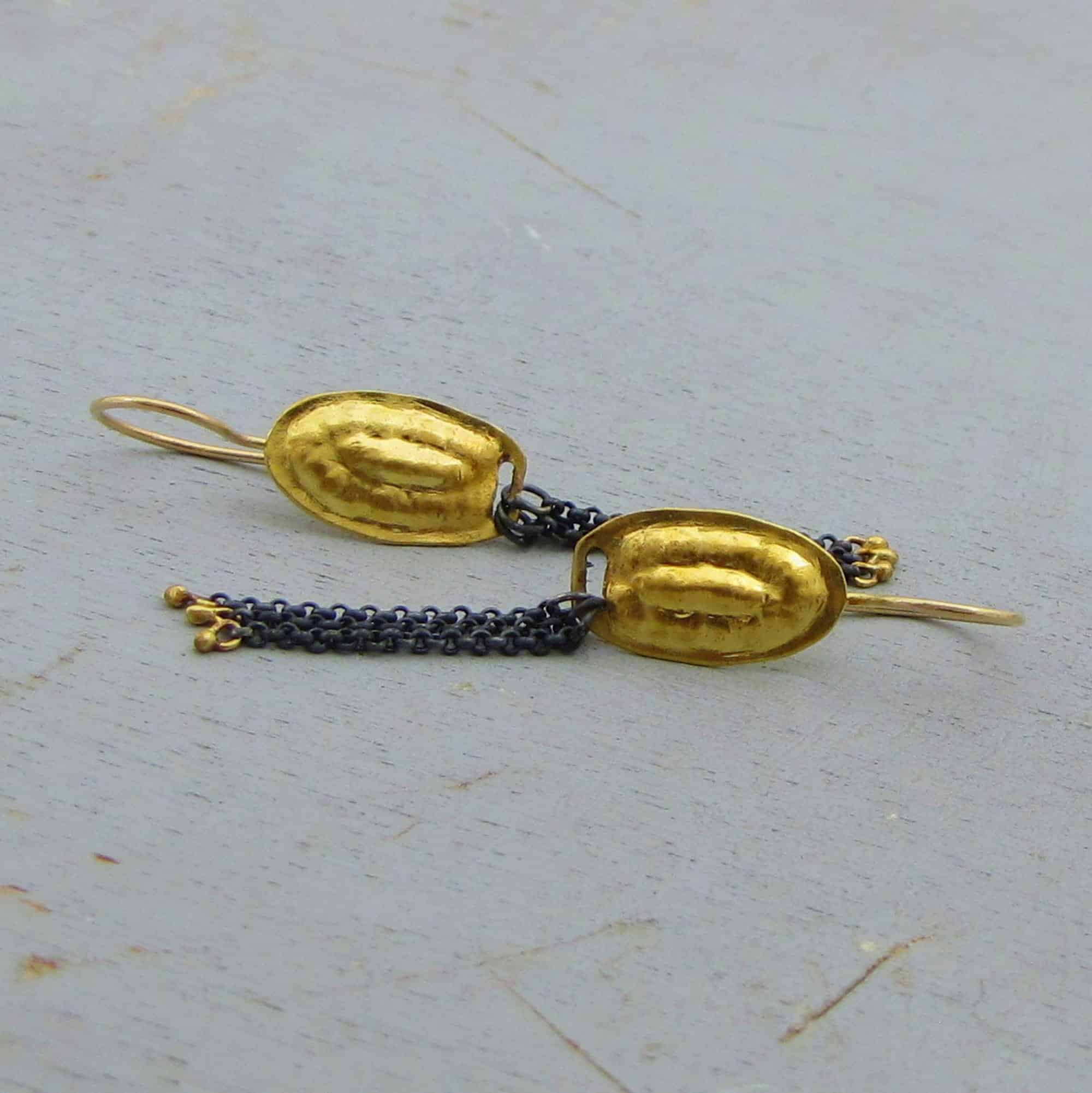 Oval 22k gold earrings with silver chains