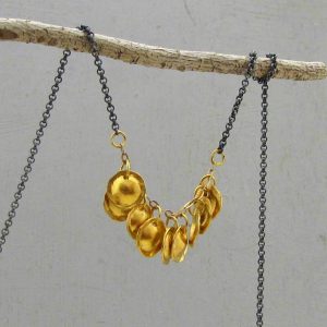 22 Karat Gold and Silver charms necklace