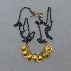 22 Karat Gold and Silver charms necklace