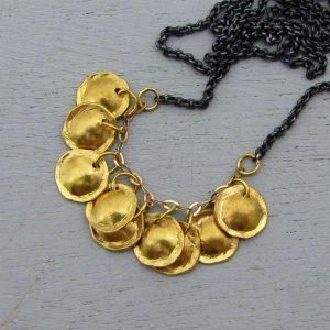 22 Karat Gold and Silver charms necklace