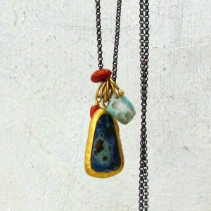 Calsilica 24k Gold pendant on silver chain