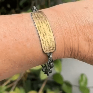 22k gold bar and silver bracelet