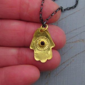 22k gold Hamsa and Garnet necklace