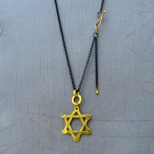 Star of David 22k gold pendant on silver chain