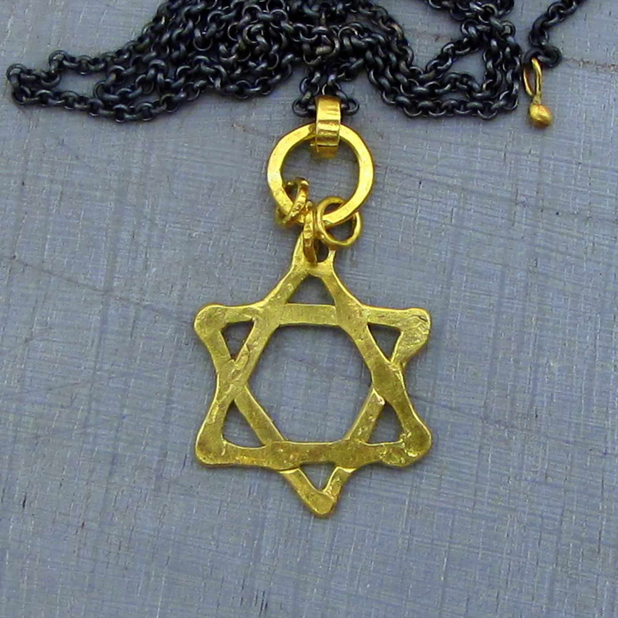 22 karat gold Star of David pendant on silver chain