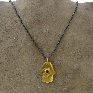 22k gold Hamsa and Garnet necklace