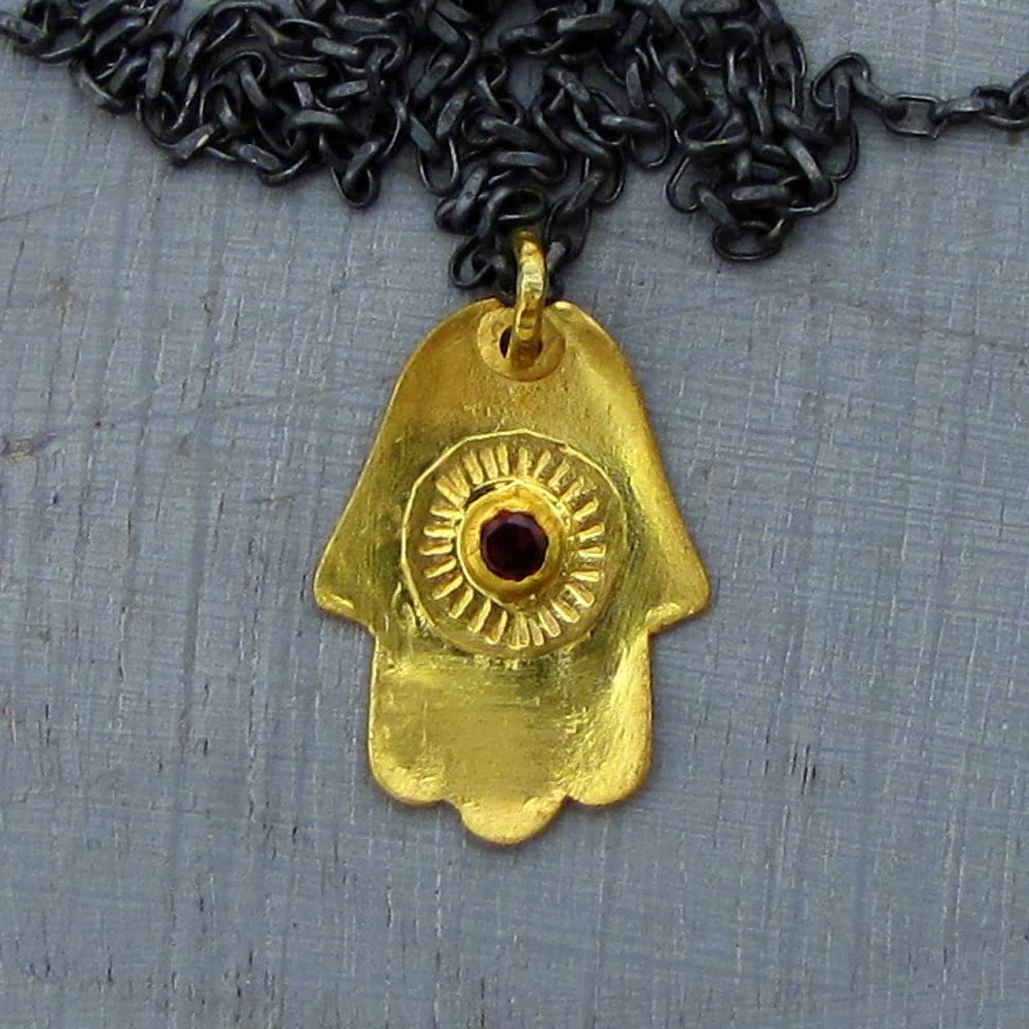 22k gold Hamsa and Garnet necklace