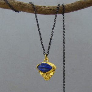 Carved Lapis Lazuli 24 karat pendant