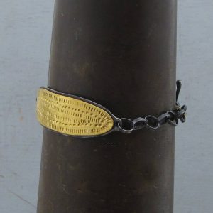 Textured 22k gold wide bar and silver bracelet