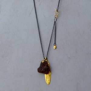 Rough Garnet 22k gold pendant on a silver chain